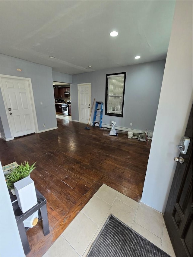 unfurnished living room with hardwood / wood-style floors