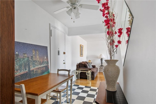 dining room featuring ceiling fan and hardwood / wood-style floors