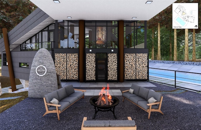 view of patio / terrace with an outdoor fire pit