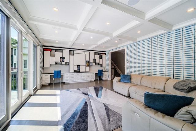 living room with beamed ceiling, hardwood / wood-style flooring, and coffered ceiling