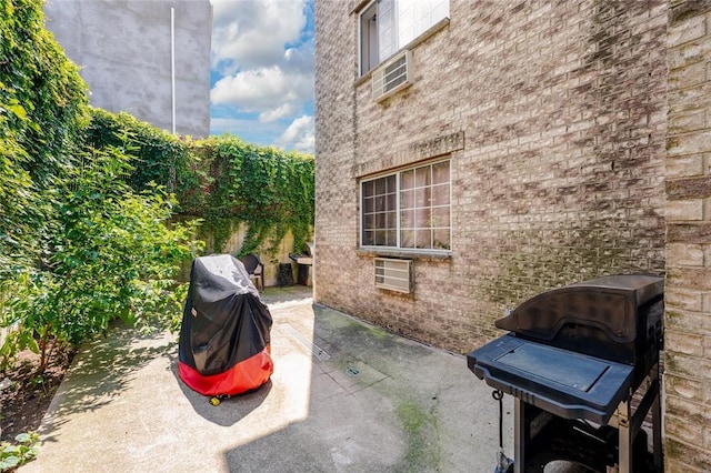 view of patio with a grill