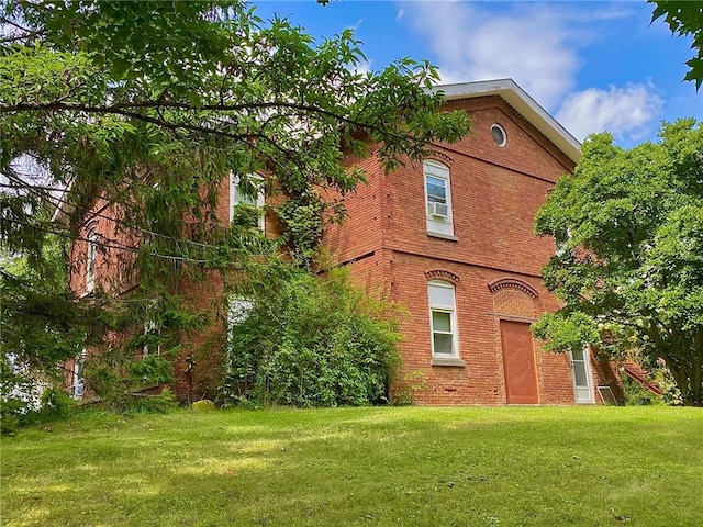 16 Orchard Dr, Rhinecliff, NY 12574 - view of property exterior with brick siding and a yard