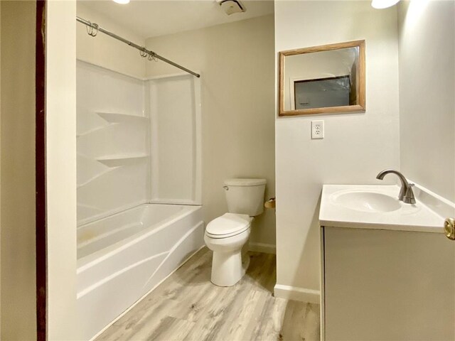 16 Orchard Dr, Rhinecliff, NY 12574 - full bath featuring vanity, shower / tub combination, toilet, wood finished floors, and baseboards