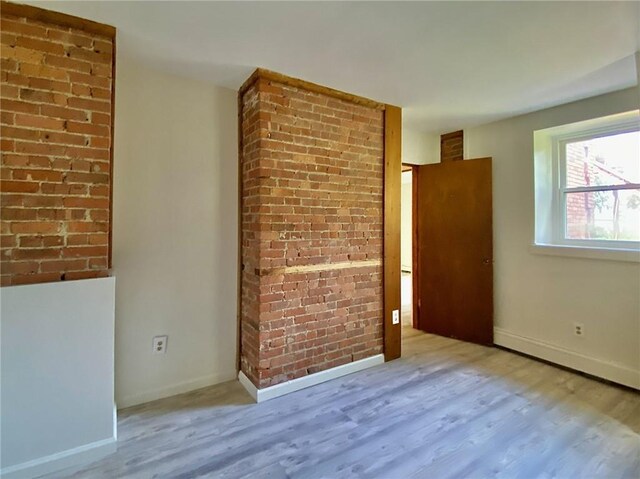 unfurnished bedroom featuring light hardwood / wood-style flooring