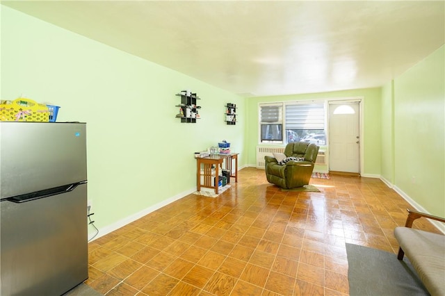 sitting room with radiator heating unit