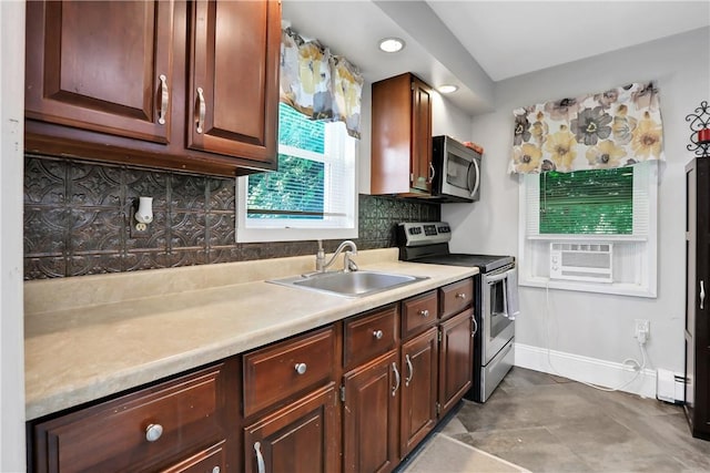 kitchen featuring tasteful backsplash, sink, cooling unit, and stainless steel appliances