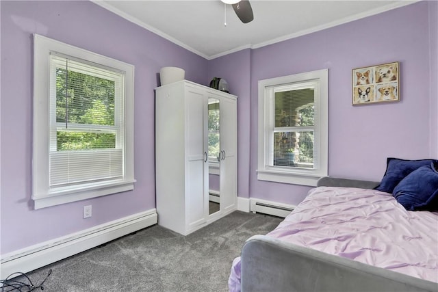 carpeted bedroom with ceiling fan, a baseboard radiator, and ornamental molding