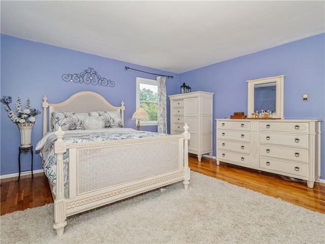 bedroom featuring hardwood / wood-style floors