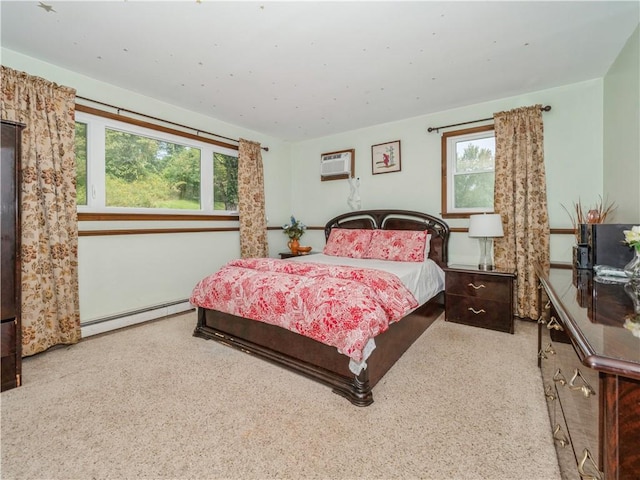 bedroom with a baseboard radiator, a wall unit AC, and multiple windows