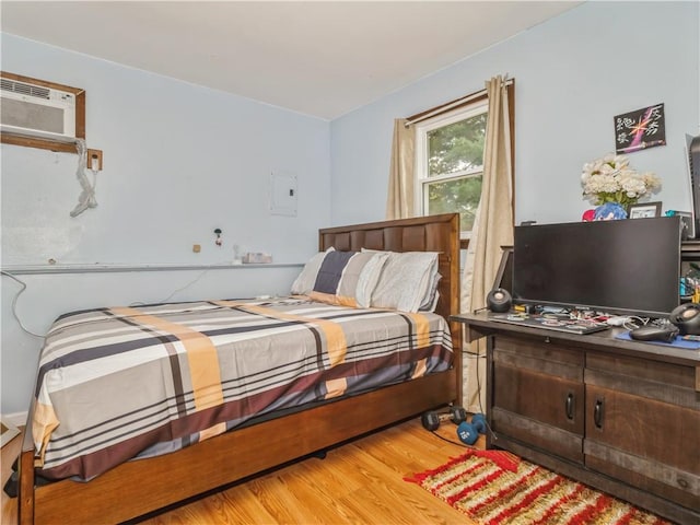 bedroom featuring hardwood / wood-style floors