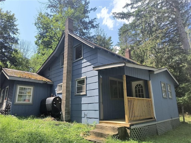 1131 County Route 31, Glen Spey, NY 12737 - view of home's exterior with a chimney and heating fuel