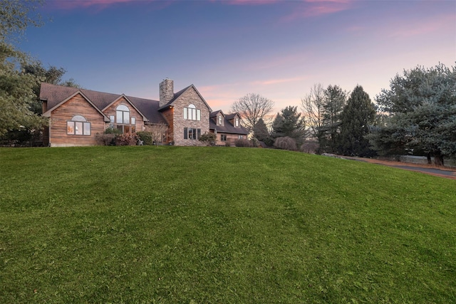 view of front of house with a lawn