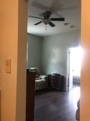 hallway featuring dark hardwood / wood-style floors