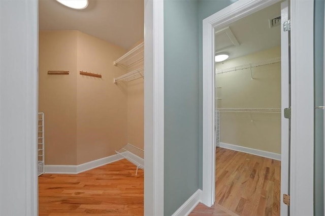 spacious closet with light wood-type flooring