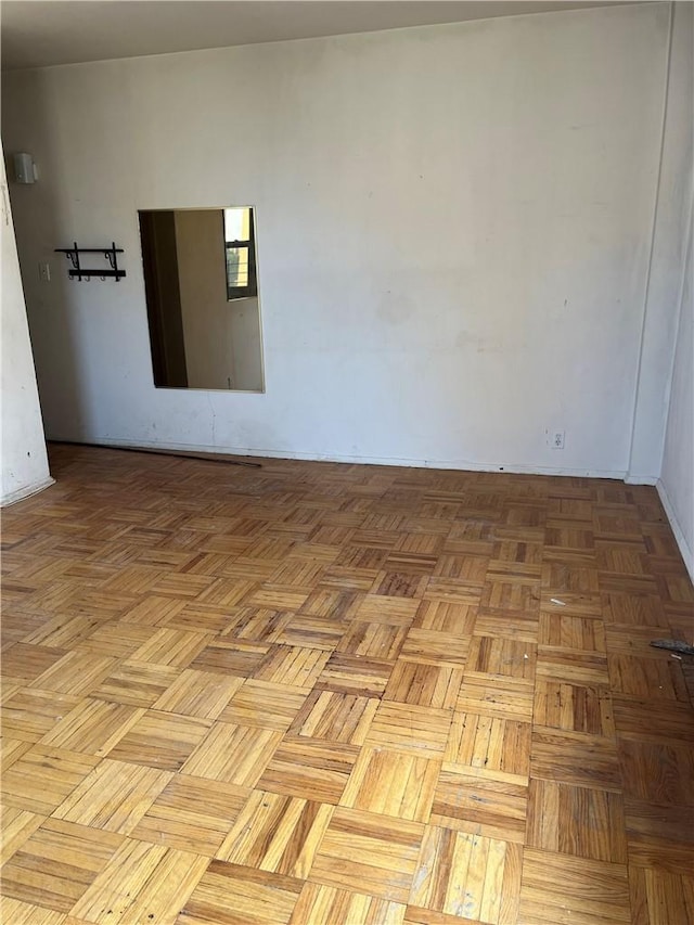 spare room featuring light parquet floors