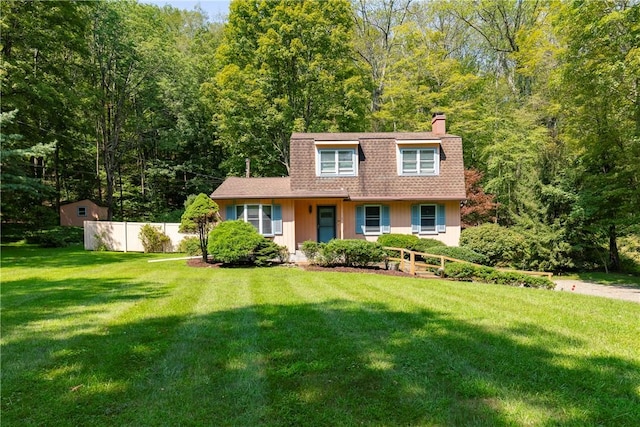 view of front of house with a front lawn