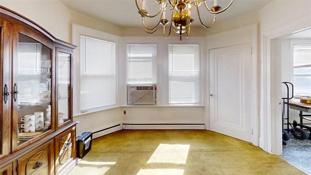 carpeted dining area featuring cooling unit and a notable chandelier