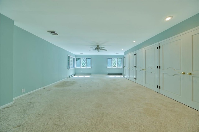 432 Black Forest Rd, Glen Spey, NY 12737 - unfurnished bedroom with carpet floors, a baseboard heating unit, recessed lighting, multiple closets, and ceiling fan