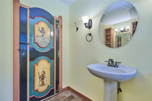 432 Black Forest Rd, Glen Spey, NY 12737 - bathroom featuring baseboards and stone finish flooring