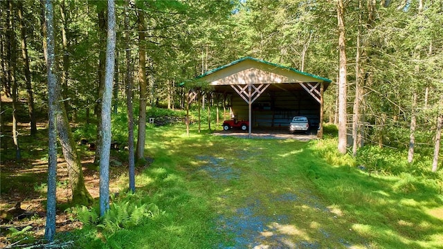 432 Black Forest Rd, Glen Spey, NY 12737 - view of yard with a detached carport, a forest view, an outbuilding, and an outdoor structure