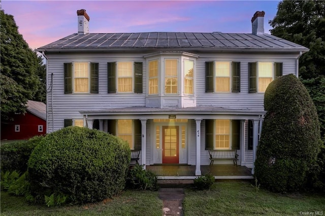 view of front facade with covered porch