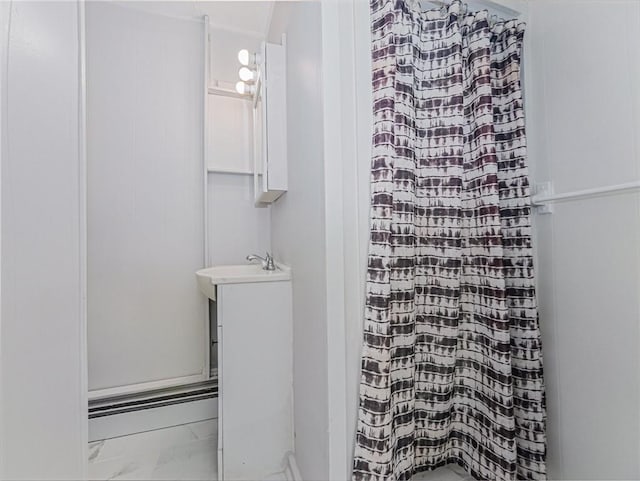 bathroom with vanity and curtained shower