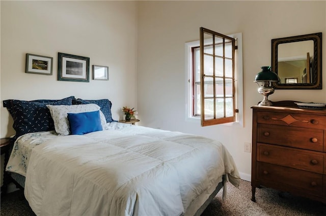 bedroom with light carpet