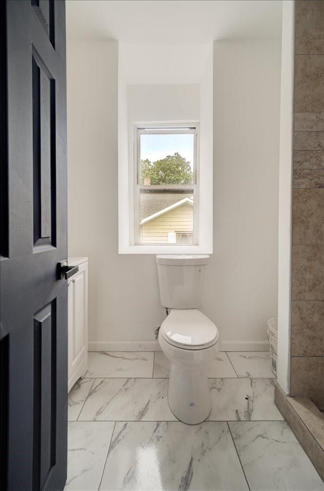 bathroom featuring toilet