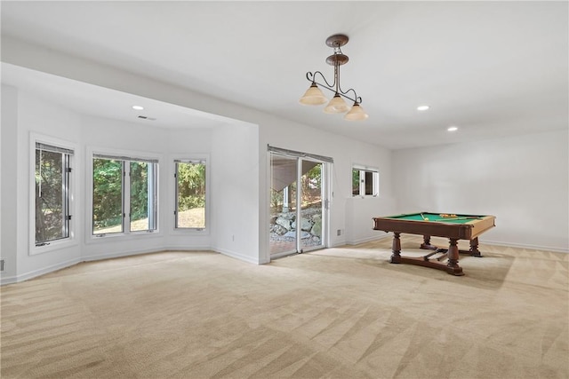 rec room featuring light carpet, plenty of natural light, and billiards