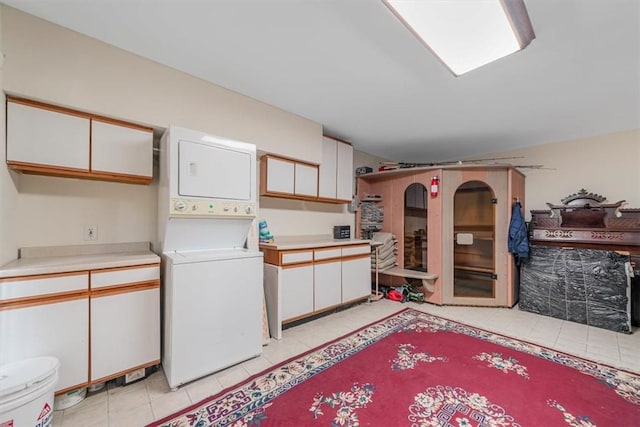 interior space featuring stacked washer and dryer