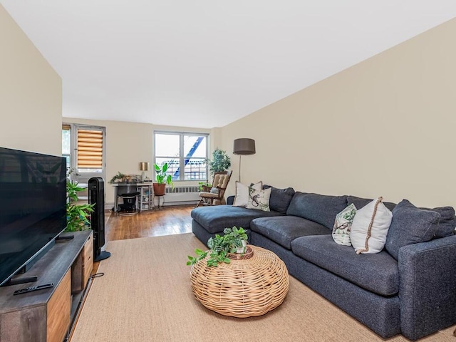3201 Grand Concourse Unit 2E, Bronx, NY 10468 - living area with radiator and wood finished floors