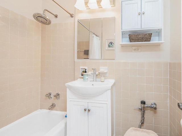 3201 Grand Concourse Unit 2E, Bronx, NY 10468 - full bathroom with tile walls, vanity, and shower / bath combo