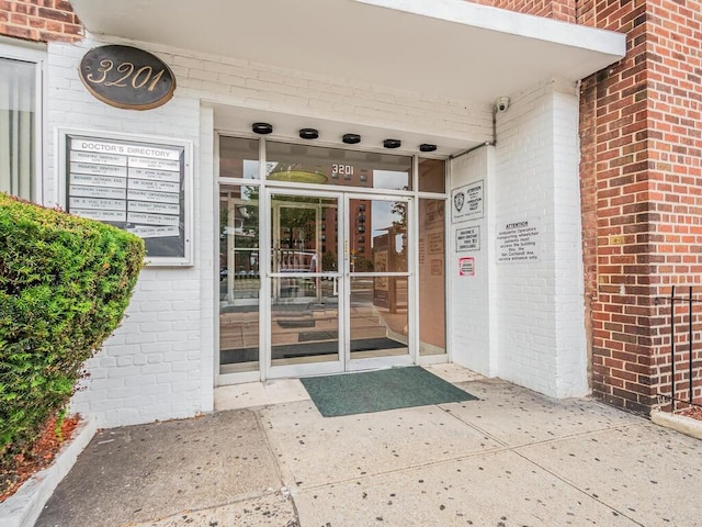 3201 Grand Concourse Unit 2E, Bronx, NY 10468 - entrance to property featuring brick siding and a security system