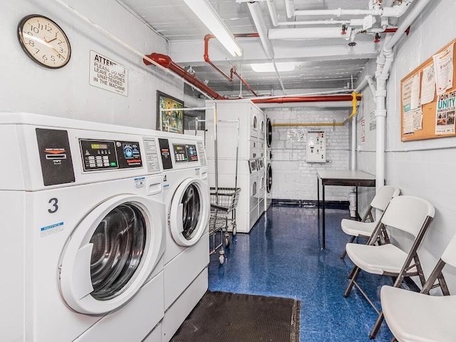 3201 Grand Concourse Unit 2E, Bronx, NY 10468 - community laundry room featuring stacked washer and clothes dryer and washer and clothes dryer