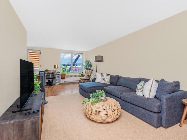 3201 Grand Concourse Unit 2E, Bronx, NY 10468 - living room with radiator and wood finished floors