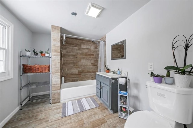 full bathroom with vanity, shower / bath combination with curtain, toilet, and wood-type flooring