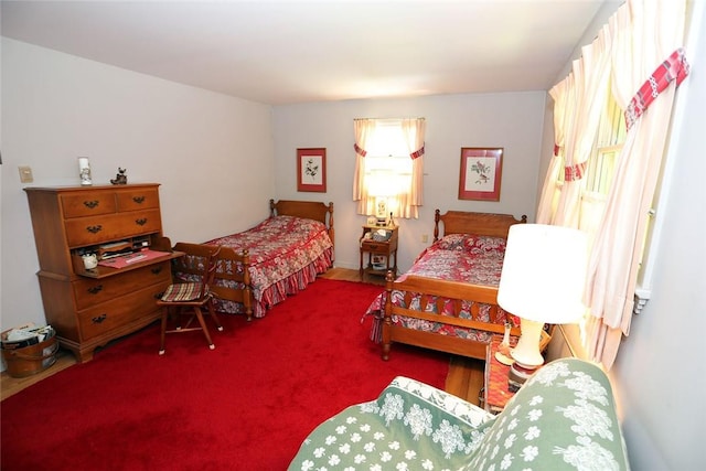 bedroom featuring carpet