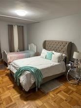 bedroom with parquet floors