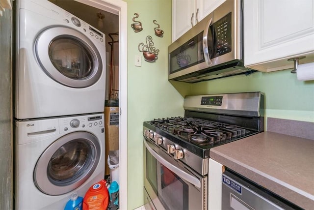 laundry room featuring stacked washer / dryer