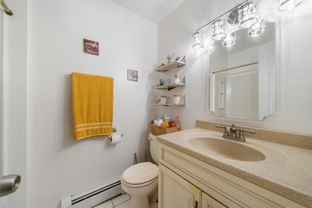 bathroom featuring vanity, a shower, a baseboard heating unit, tile patterned floors, and toilet