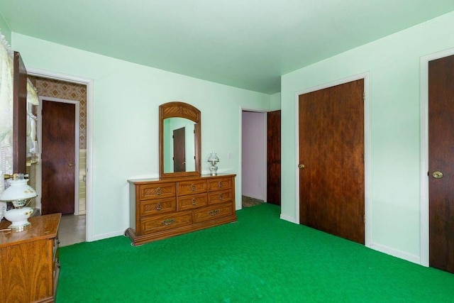 carpeted bedroom with a closet