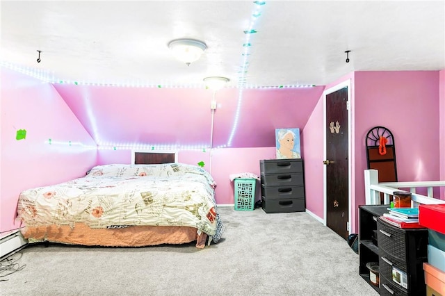 carpeted bedroom with a baseboard radiator and vaulted ceiling