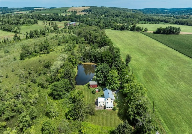 aerial view featuring a rural view and a water view