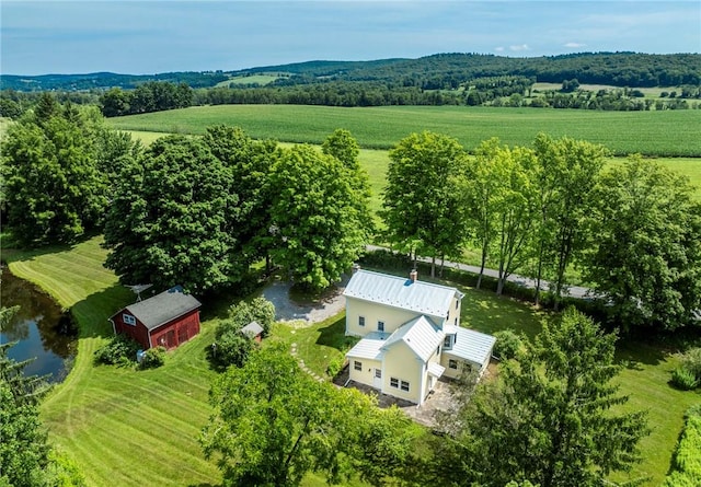 bird's eye view with a water view and a rural view