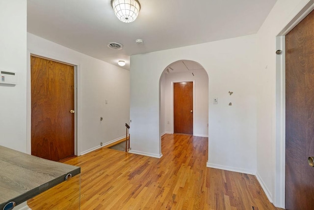 spare room featuring light hardwood / wood-style flooring