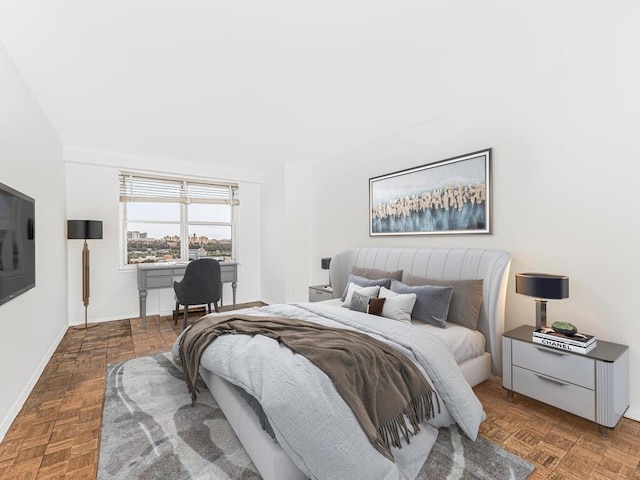 bedroom with parquet flooring