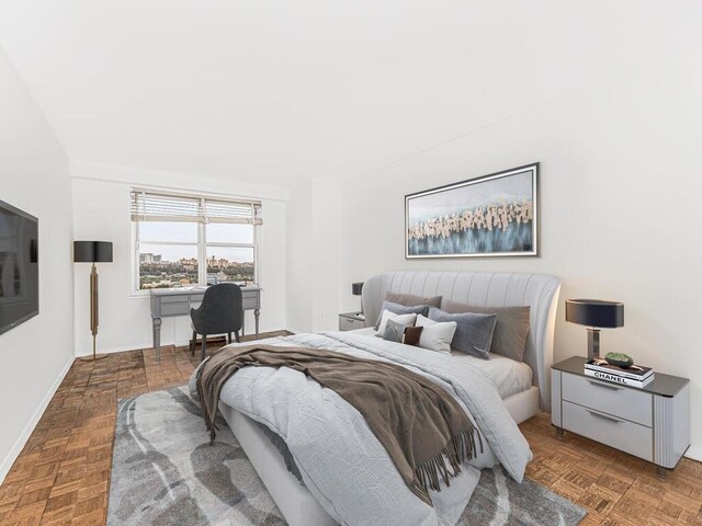 555 Kappock St Unit 11B, Bronx, NY 10463 - bedroom with a desk and baseboards