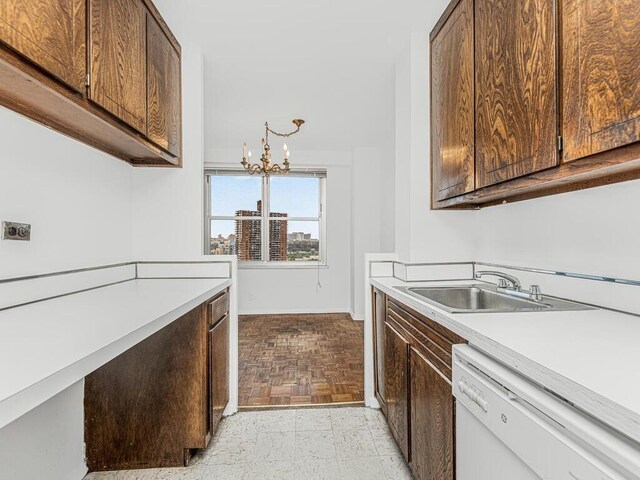 555 Kappock St Unit 11B, Bronx, NY 10463 - kitchen featuring white dishwasher, light countertops, a chandelier, and dark brown cabinets