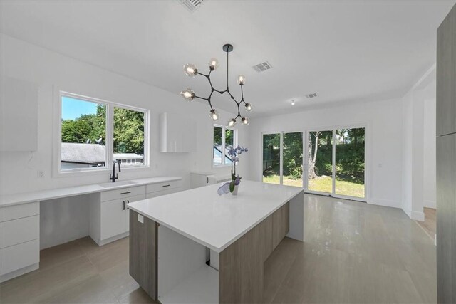 3 Forshee St, Monroe, NY 10950 - kitchen with modern cabinets, healthy amount of natural light, and light countertops