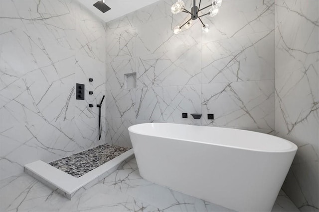 bathroom featuring plus walk in shower and tile walls